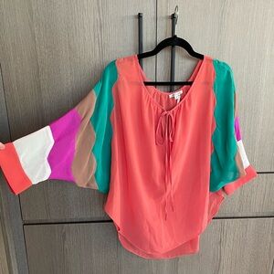 Orange top, color block sleeves!